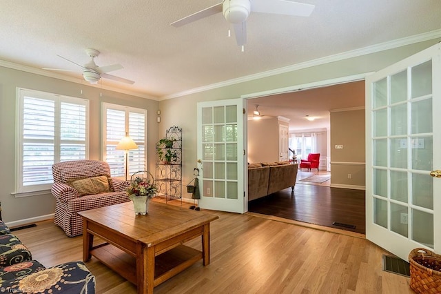 97 Shadylawn Dr, Winston-Salem, NC 27104 - living area featuring ceiling fan, crown molding, and wood finished floors
