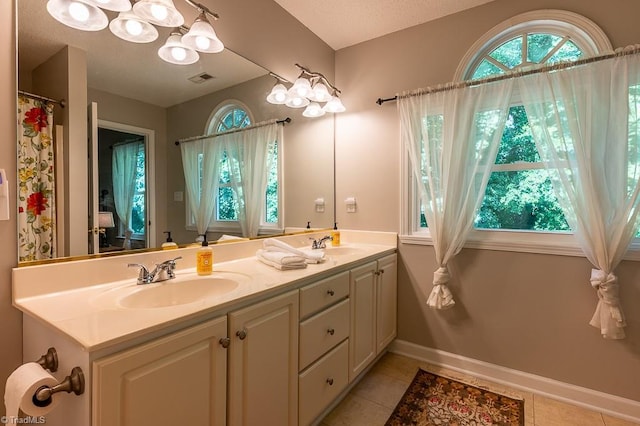 97 Shadylawn Dr, Winston-Salem, NC 27104 - full bath featuring double vanity and tile patterned floors