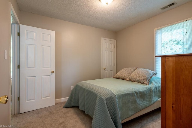 97 Shadylawn Dr, Winston-Salem, NC 27104 - carpeted bedroom with a textured ceiling