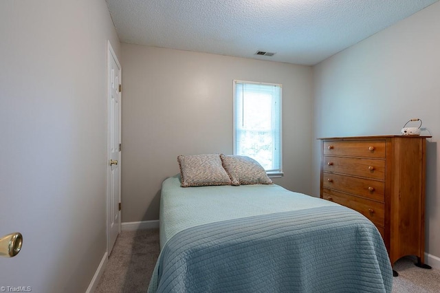 97 Shadylawn Dr, Winston-Salem, NC 27104 - bedroom featuring light colored carpet and a textured ceiling