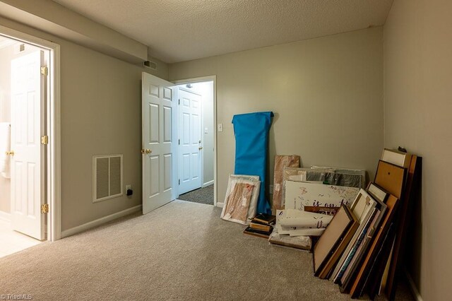 97 Shadylawn Dr, Winston-Salem, NC 27104 - carpeted bedroom featuring a textured ceiling and baseboards