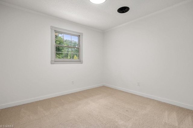 317 Benbow Dr, East Bend, NC 27018 - empty room featuring carpet flooring, baseboards, a textured ceiling, and ornamental molding