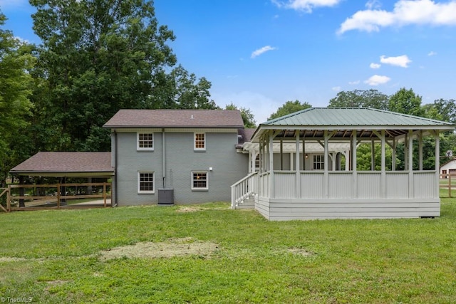 317 Benbow Dr, East Bend, NC 27018 - rear view of property featuring central AC unit, a yard, and a gazebo