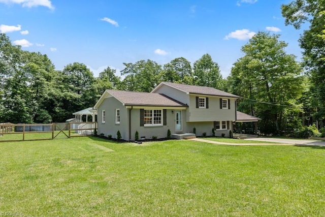 317 Benbow Dr, East Bend, NC 27018 - tri-level home featuring view of scattered trees and driveway