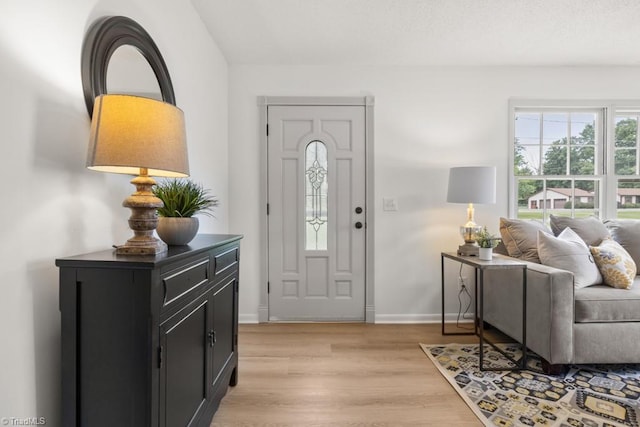 317 Benbow Dr, East Bend, NC 27018 - entrance foyer with light wood-style flooring and baseboards