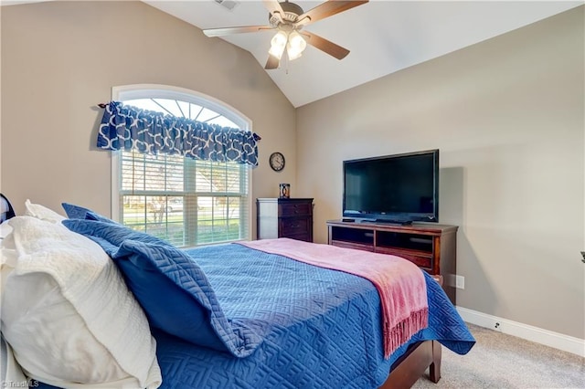 carpeted bedroom featuring ceiling fan and vaulted ceiling