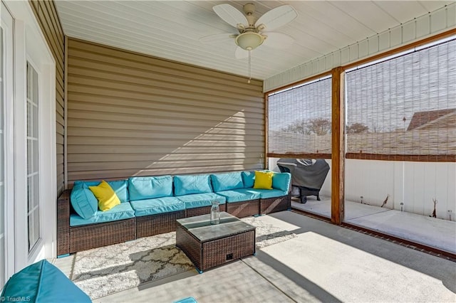 sunroom / solarium with ceiling fan