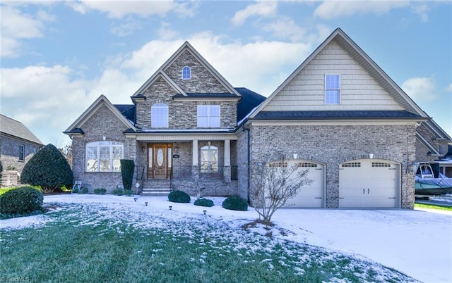 craftsman-style home featuring a porch and a garage