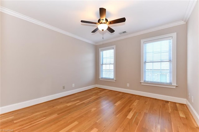 unfurnished room with light hardwood / wood-style floors, ceiling fan, ornamental molding, and plenty of natural light