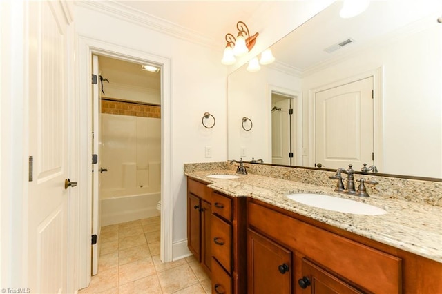 full bathroom featuring toilet, tile patterned flooring, ornamental molding, vanity, and tub / shower combination