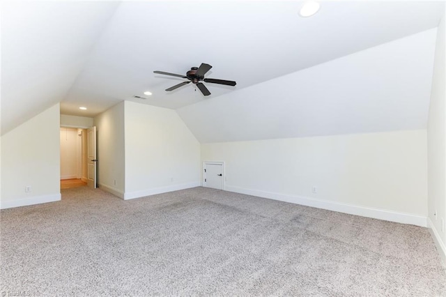 bonus room with carpet floors, lofted ceiling, and ceiling fan