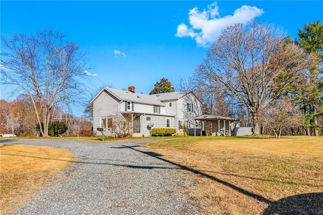 view of front of house with a front lawn