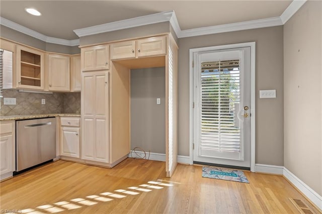 kitchen featuring dishwasher, decorative backsplash, ornamental molding, light hardwood / wood-style floors, and light stone counters