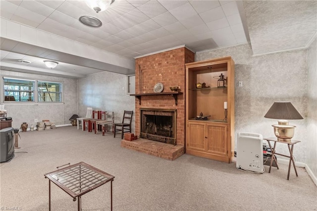 living room featuring carpet flooring and a brick fireplace