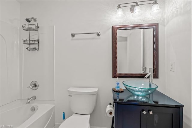 full bathroom featuring bathing tub / shower combination, vanity, and toilet