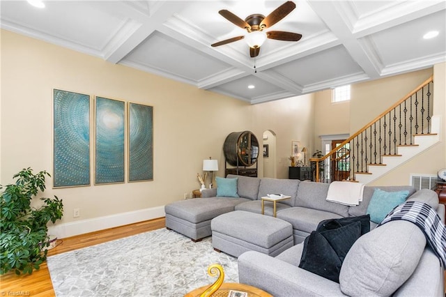 3303 Tanner Ct, Summerfield, NC 27358 - living room with stairs, ceiling fan, coffered ceiling, and wood finished floors
