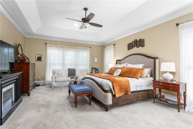 3303 Tanner Ct, Summerfield, NC 27358 - carpeted bedroom featuring a raised ceiling, crown molding, and ceiling fan