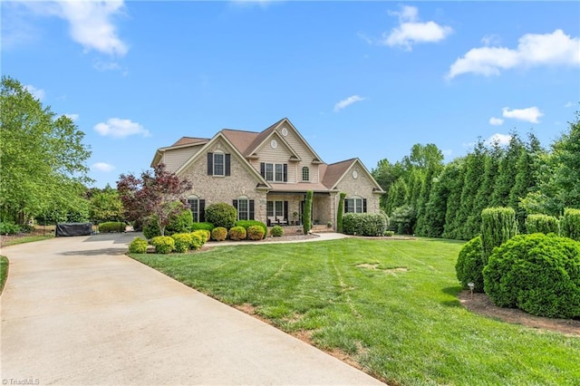 3303 Tanner Ct, Summerfield, NC 27358 - view of front of home with a front lawn and brick siding