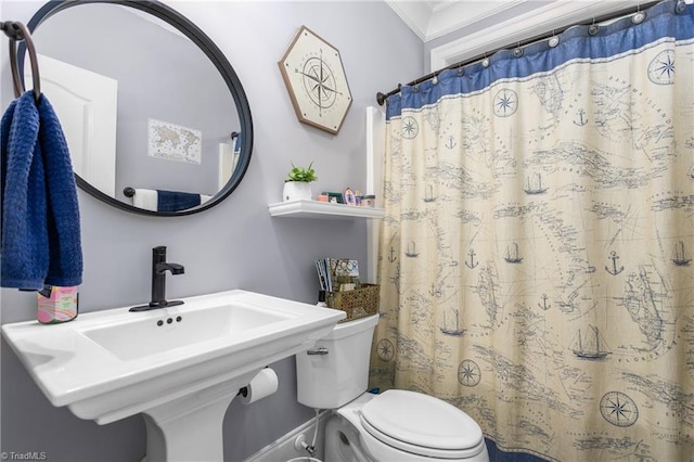 3303 Tanner Ct, Summerfield, NC 27358 - full bathroom featuring a sink, crown molding, toilet, and a shower with shower curtain