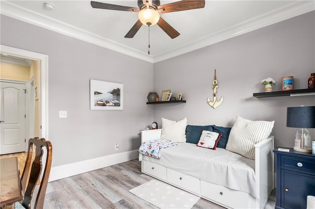 3303 Tanner Ct, Summerfield, NC 27358 - bedroom featuring ceiling fan, wood finished floors, baseboards, and ornamental molding