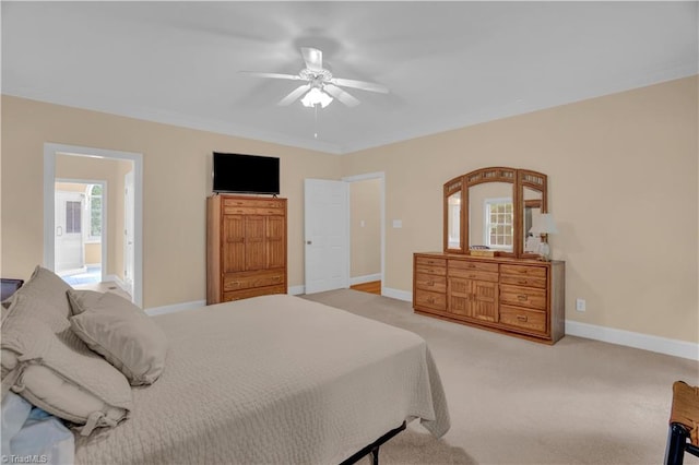 bedroom featuring ceiling fan, carpet flooring, and multiple windows