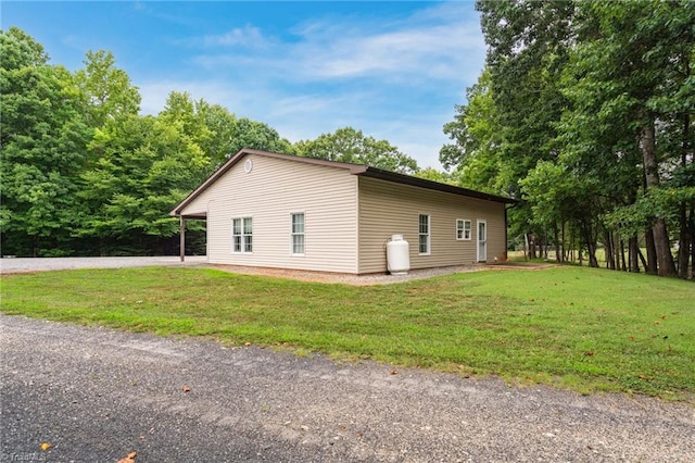 view of property exterior featuring a yard