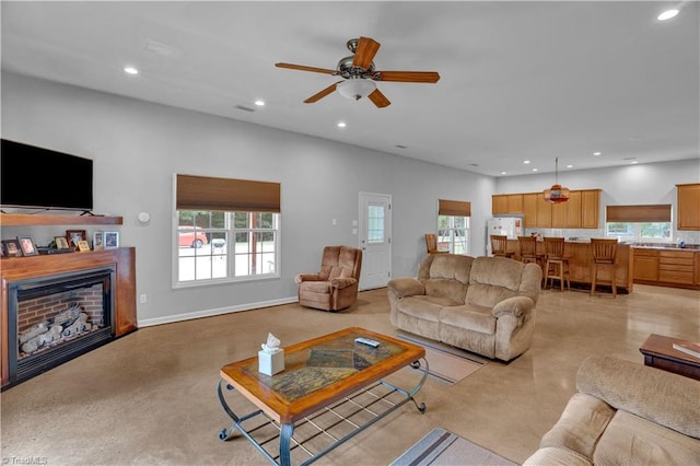 living room featuring ceiling fan