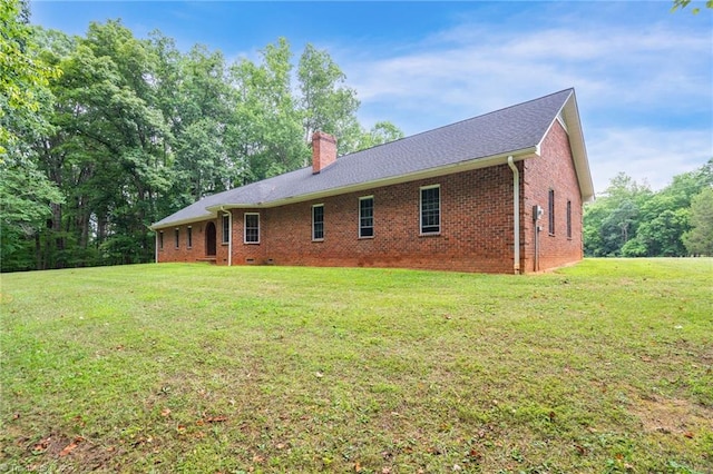 exterior space with a lawn