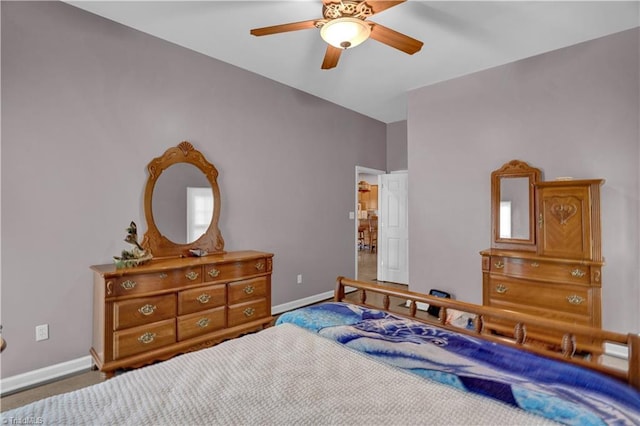 bedroom with ceiling fan and carpet flooring