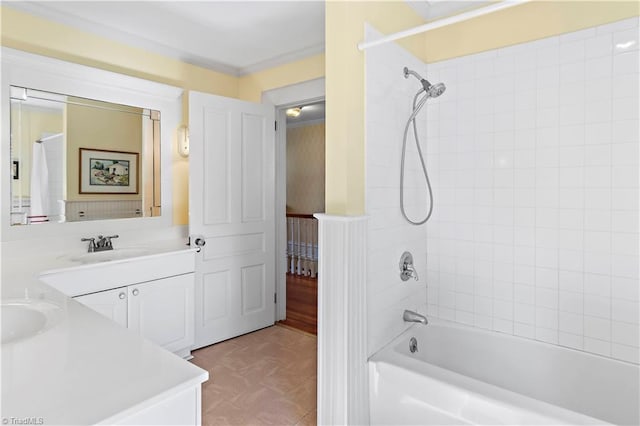 full bathroom featuring tub / shower combination, vanity, and tile patterned floors