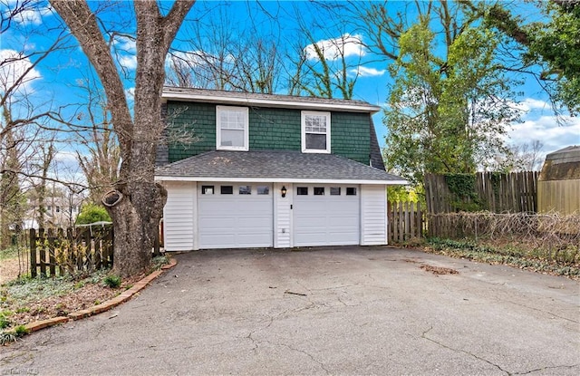 garage with fence