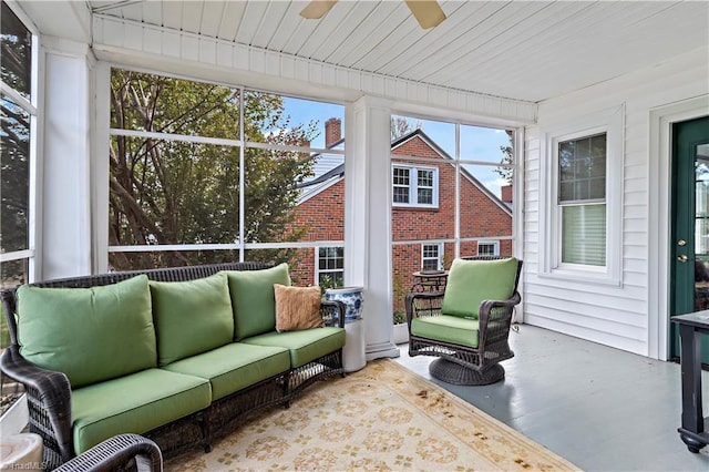 sunroom / solarium with ceiling fan