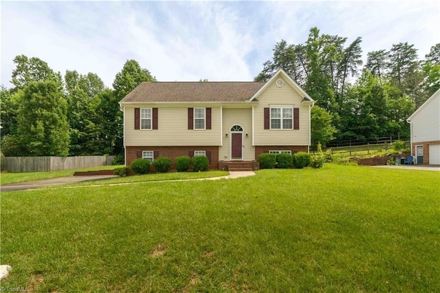 6919 Channel Forest Rd, Belews Creek, NC 27009 - bi-level home featuring brick siding