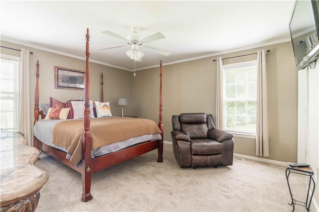 6919 Channel Forest Rd, Belews Creek, NC 27009 - bedroom featuring multiple windows, light carpet, crown molding, and a ceiling fan