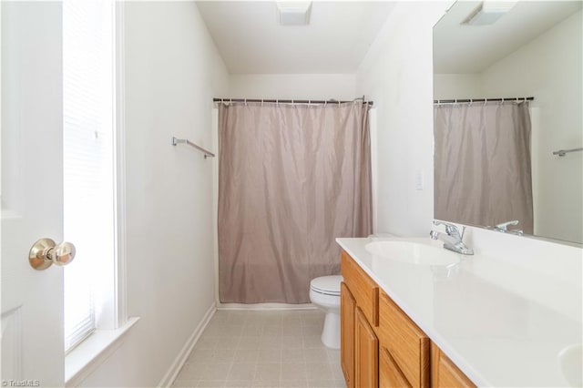 6919 Channel Forest Rd, Belews Creek, NC 27009 - bathroom featuring vanity, curtained shower, and tile patterned floors