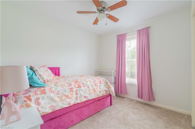 6919 Channel Forest Rd, Belews Creek, NC 27009 - carpeted bedroom featuring a ceiling fan