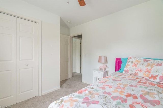 6919 Channel Forest Rd, Belews Creek, NC 27009 - bedroom with light carpet, a closet, and ceiling fan