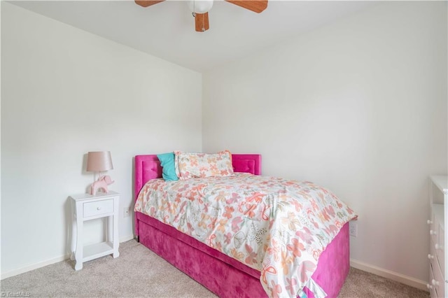 6919 Channel Forest Rd, Belews Creek, NC 27009 - carpeted bedroom with baseboards and a ceiling fan