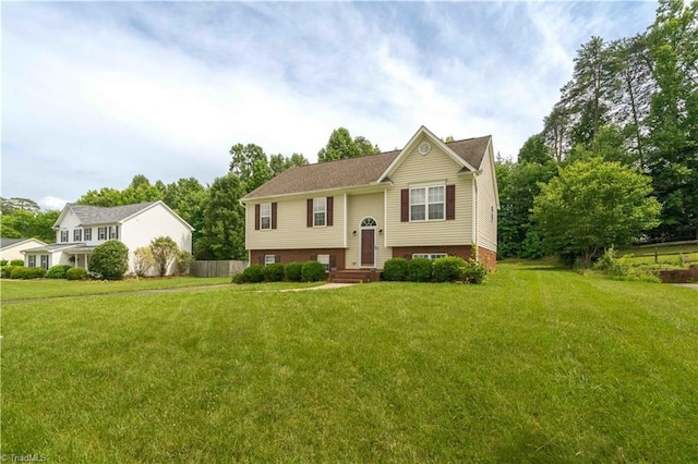 6919 Channel Forest Rd, Belews Creek, NC 27009 - raised ranch with a front lawn