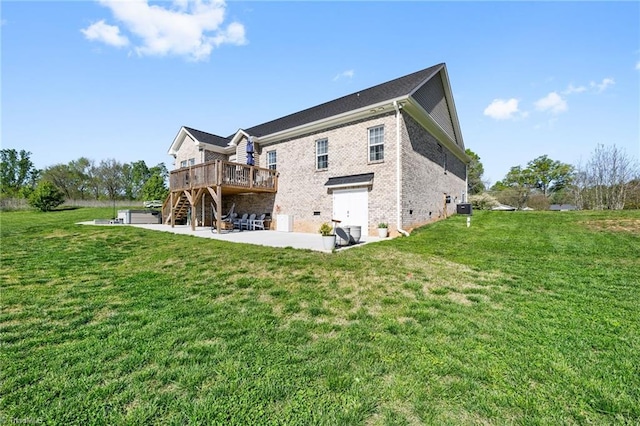 rear view of property featuring central AC, a deck, a patio, brick siding, and stairs