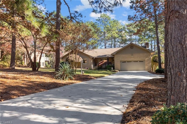 ranch-style home featuring a garage