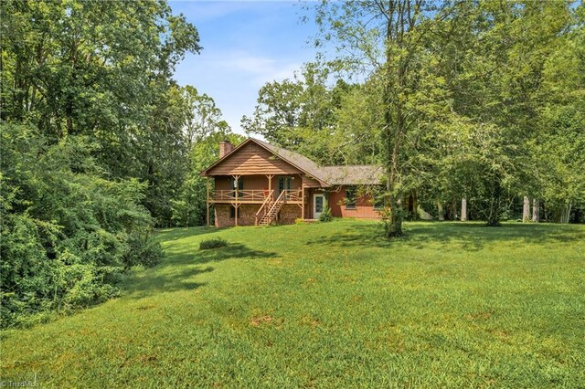 exterior space with a front yard