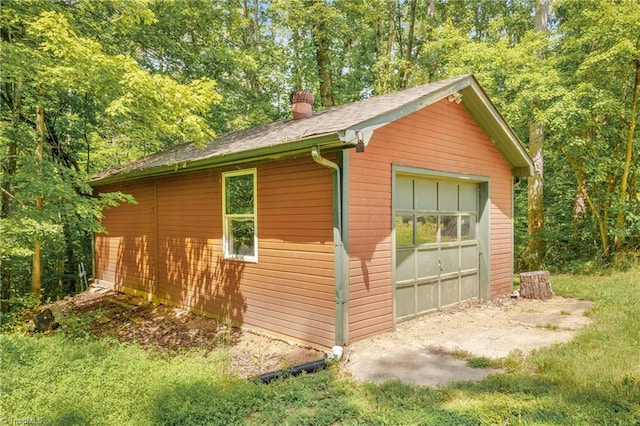 view of outbuilding featuring a garage