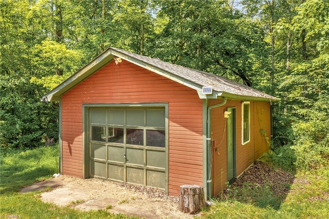 view of outbuilding featuring a garage