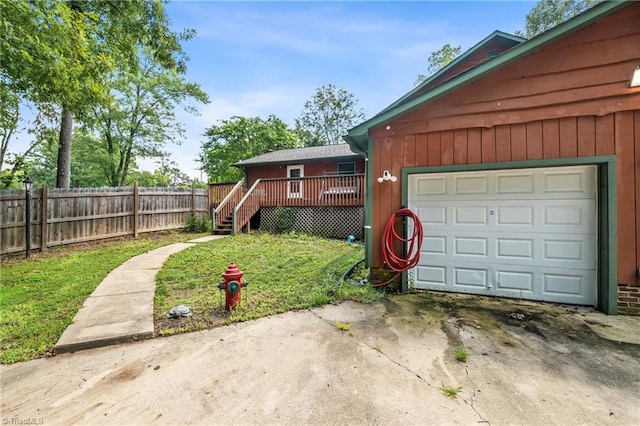 garage with a yard