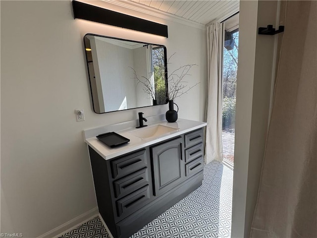 bathroom featuring vanity and crown molding