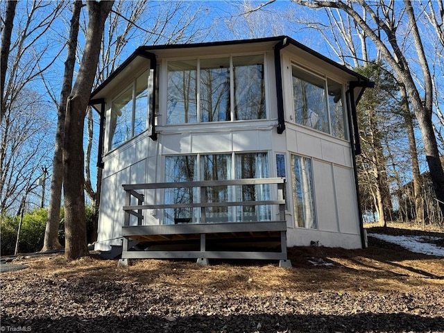 view of front of property with a sunroom