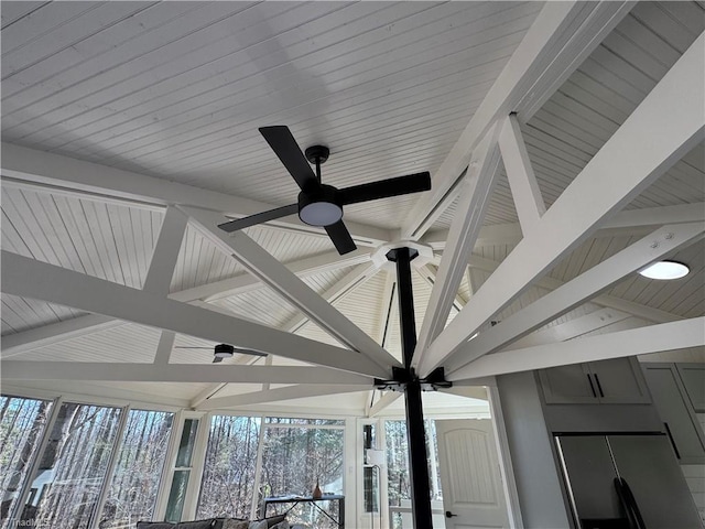 details featuring ceiling fan and beamed ceiling