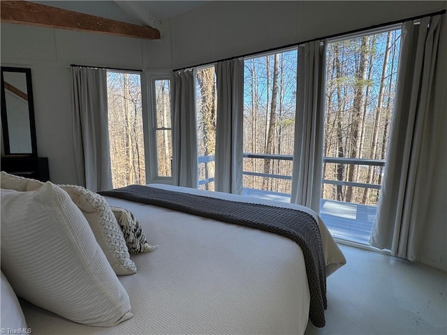 bedroom featuring beamed ceiling