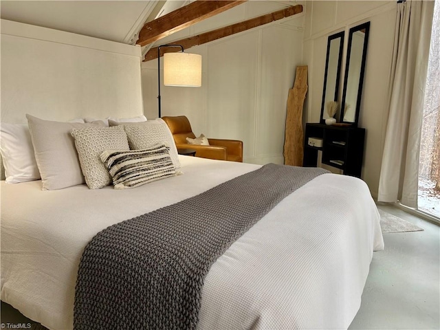 bedroom featuring concrete flooring, access to outside, and lofted ceiling with beams